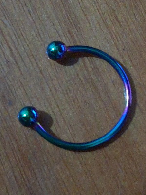 Steel chest piercing new, green and purple