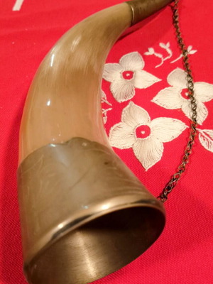 Traditional drinking horn used with engraved vintage decoration