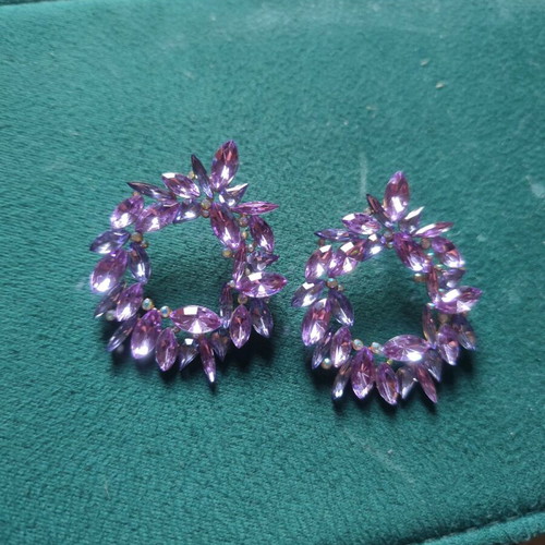 Earrings with purple stones like new