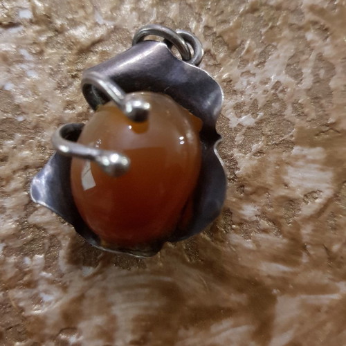 Silver pendant with ring set used