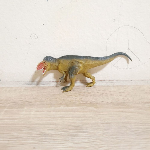 Dinosaur book like new with 3 dinosaur toys gift