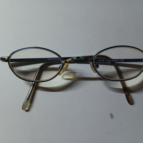 Oval children's eyeglasses used with black case