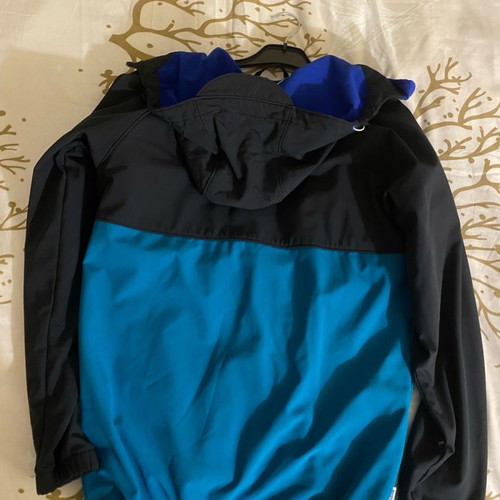 Jacket used, black with blue fleece inside, size S