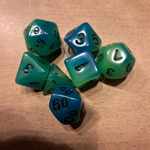5 sets of glow in the dark D&D dice