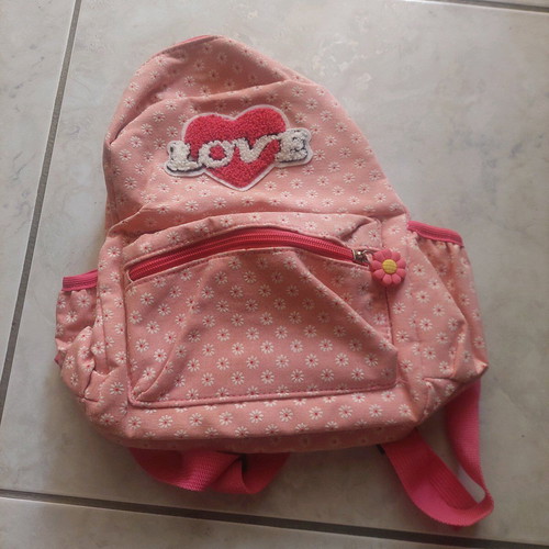 Pink children's backpack with flowers like new