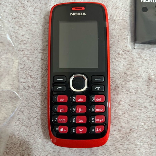 Nokia 112 unused mobile phone in box with battery, charger and headphones