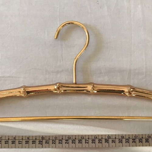 Set of 3 used antique bamboo-style metal hangers in gold color