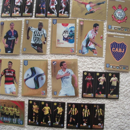 Panini FIFA 365 stickers like new, set of 32 with gold accents