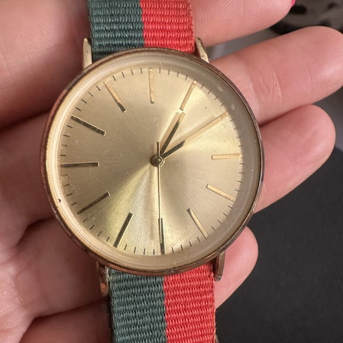 Fashion watch with gold case and NATO fabric strap