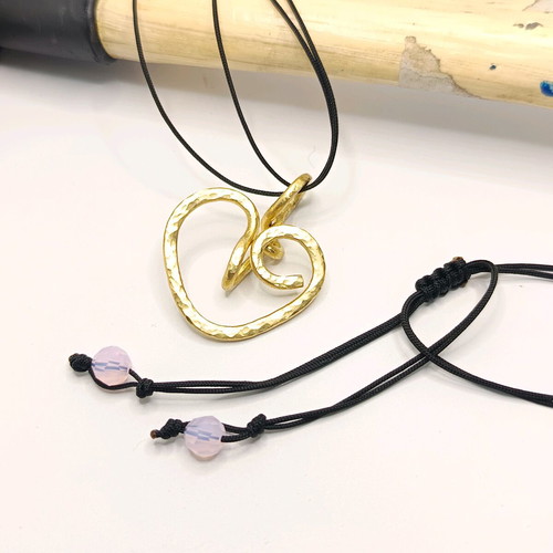 Handmade heart pendant brass with pink Swarovski beads and black nylon cord