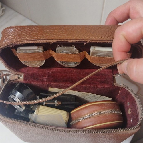 Vintage camera accessories in leather case used