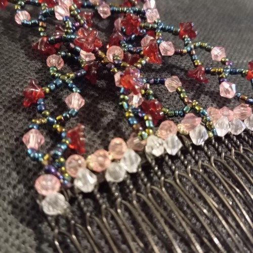 Hair comb like new with red, pink, black and transparent beads