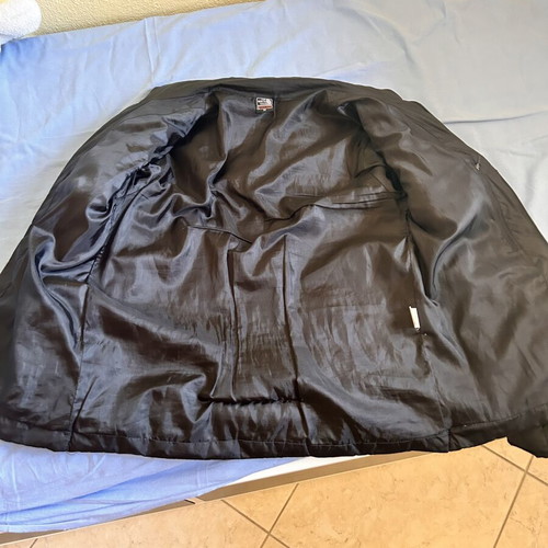 The North Face black jacket, logo faded