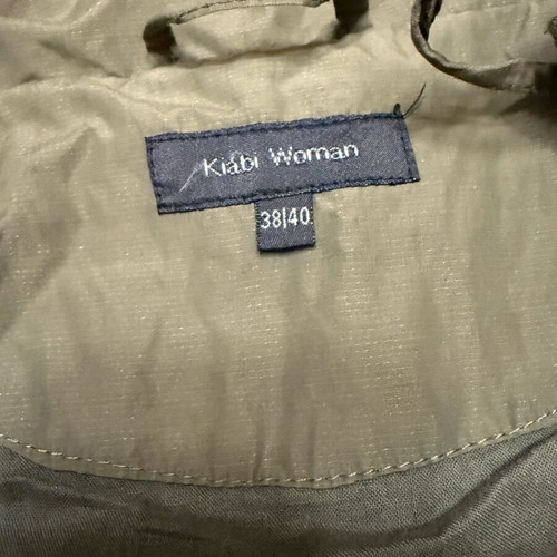 Set khaki trench coat and black blouse used