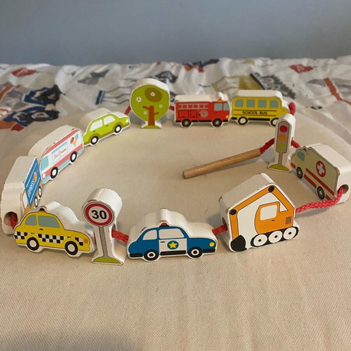 Fine motor skills toy used with cars on a string