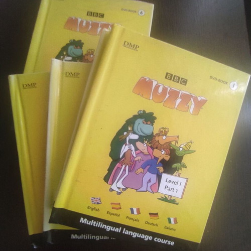 Muzzy language learning books used, pack of 5 books and 3 DVDs