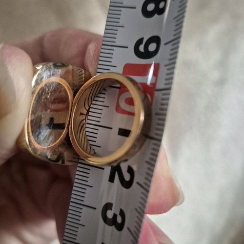 Ring with blue stone like new, gold-colored