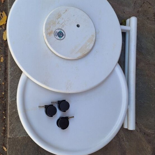 White two-tier table with wheels used