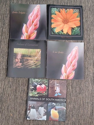 Photo albums like new, pack of 5 with flower, landscape, animal collections