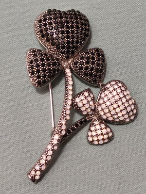 Vintage clover brooch like new with black and white rhinestones