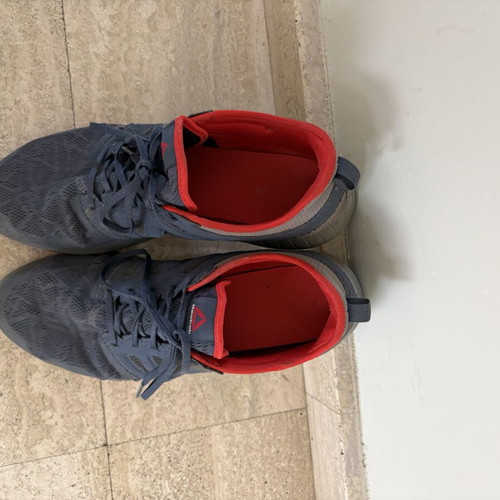 Reebok sport shoes size 45 like new, grey with orange interior