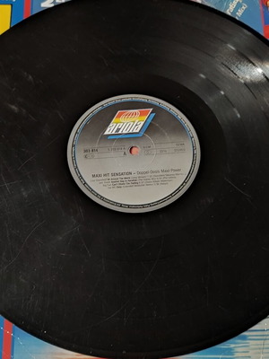 Maxi Hit Sensation vinyl record used with scratches