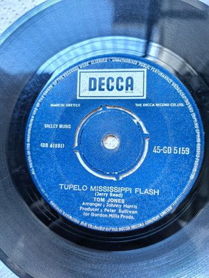 Collectible 45 RPM records used, Rufus Thomas and Tom Jones