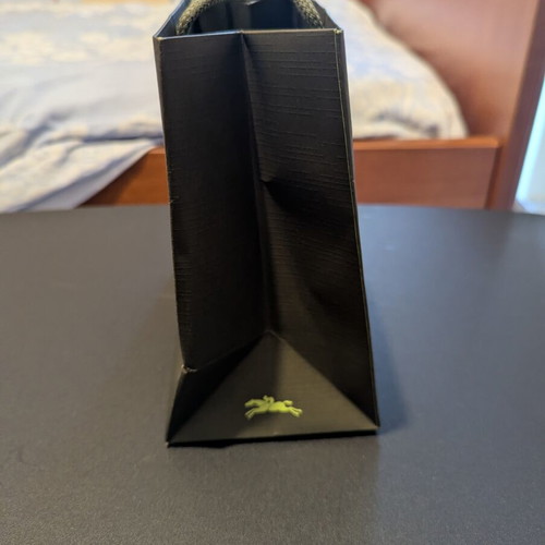 Longchamp paper bag like new, approx. 19x18 cm
