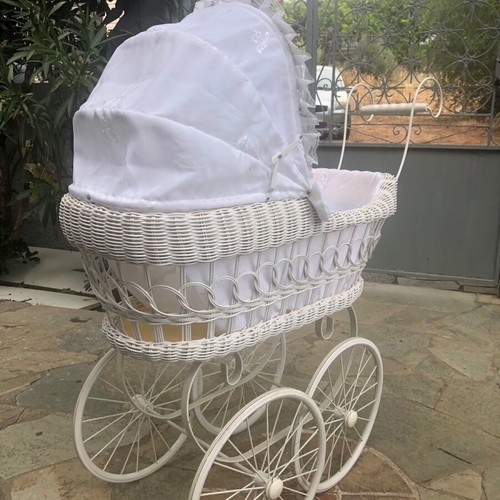 Doll pram used with white wicker basket