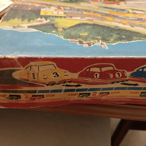 Race track toy with 3 wind-up cars used, 1960, metal