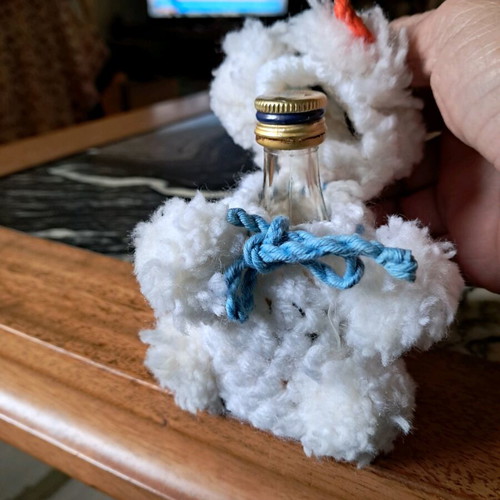 German liqueur with handmade costume like new