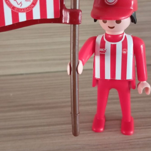 Playmobil Olympiacos fan figure with team flag, like new