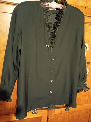 Black shirt with gold buttons and organza ruffles like new