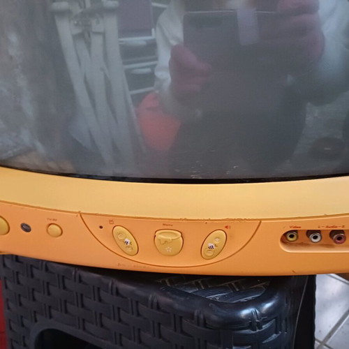 Small TV used for decoration, unknown if works