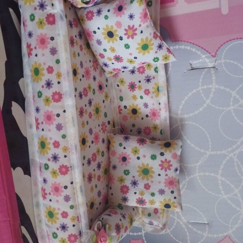 Fabric doll sofa with floral pattern