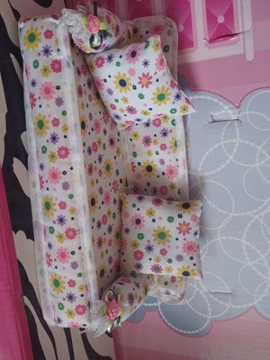 Fabric doll sofa with floral pattern