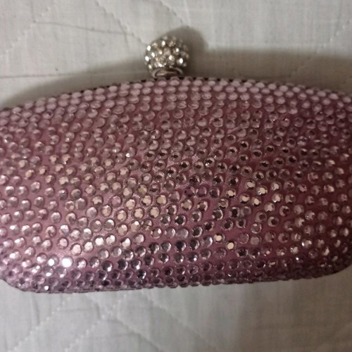 Accessorize pink clutch bag