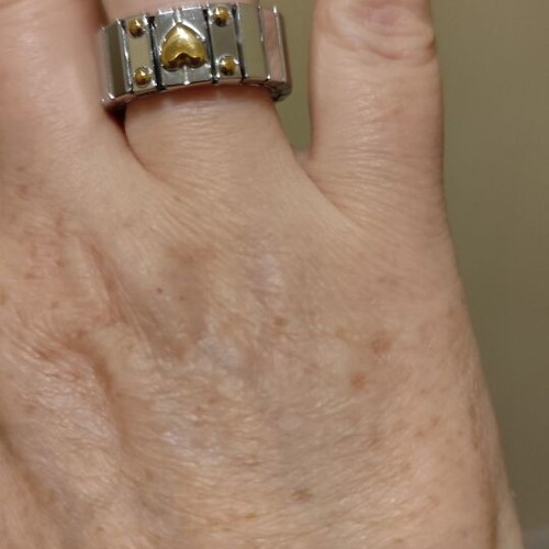 Silver ring with gold heart stainless steel new, size 8