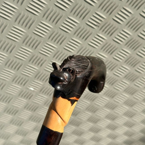 Handmade wooden walking stick used with lion head and spiral decoration