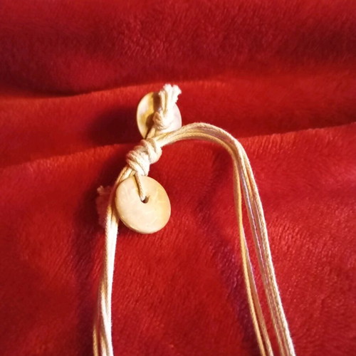 Summer necklace with white coral, cords and shell details