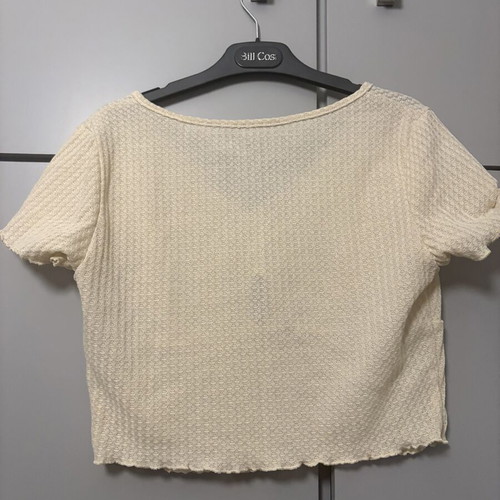 Women's cream crop top with V-neck and keyhole cut-out