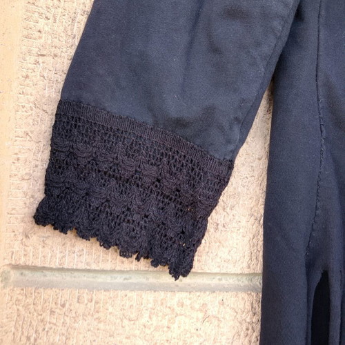 Black women's cardigan with fringe and lace detail, boho casual