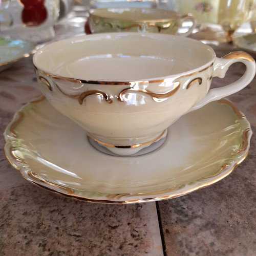 Collectible tea cup set porcelain with gold details like new