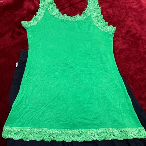 Women's set of 2 pieces used, black BSB skirt and green Voyelles lace top