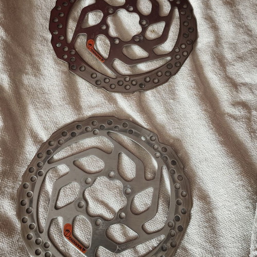 Bicycle brake discs like new with mounting bolts, set of two