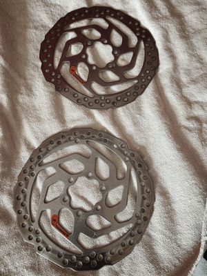 Bicycle brake discs like new with mounting bolts, set of two