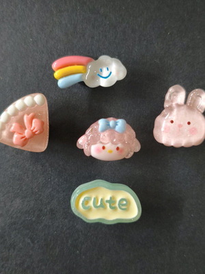 Crocs charms set like new, pink and turquoise