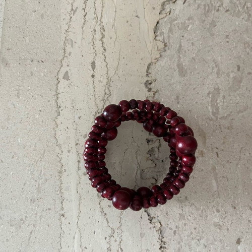 Wooden spiral bracelet like new with adjustable diameter and brown-red beads