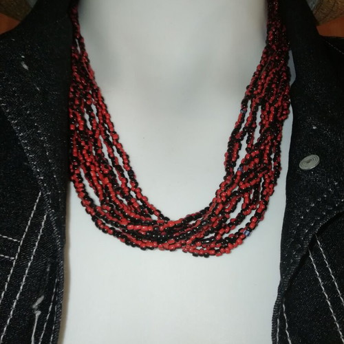 Boho style bronze necklace with small resin beads in burgundy and black
