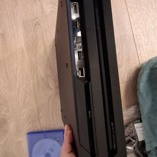 Sony PlayStation 4 Pro console 1TB with 2 games